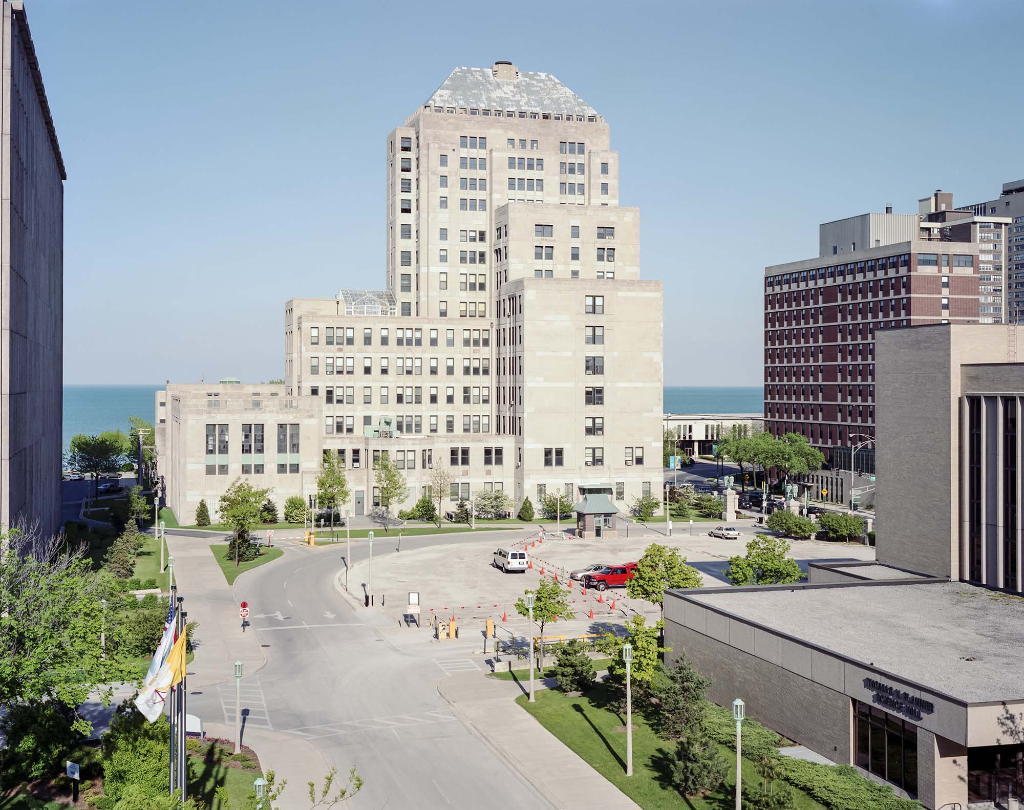 View looking from the west towards Mundelein College's Skyscraper building and Wright Hall. Some of Flanner Hall is visible.