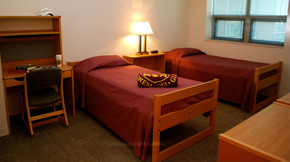 Loyola University Chicago Baumhart dorm room with twin beds