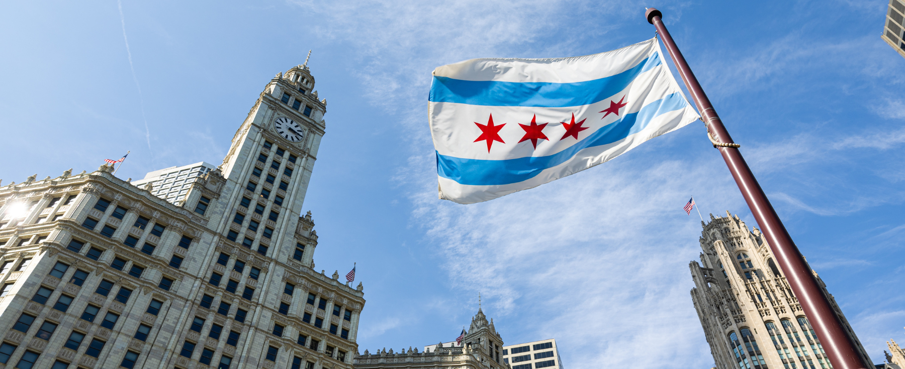 A Chicago flag flies in downtown Chicago.