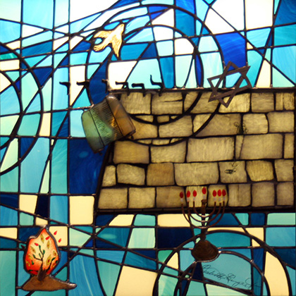 A stained glass window representing the faith of Judaism