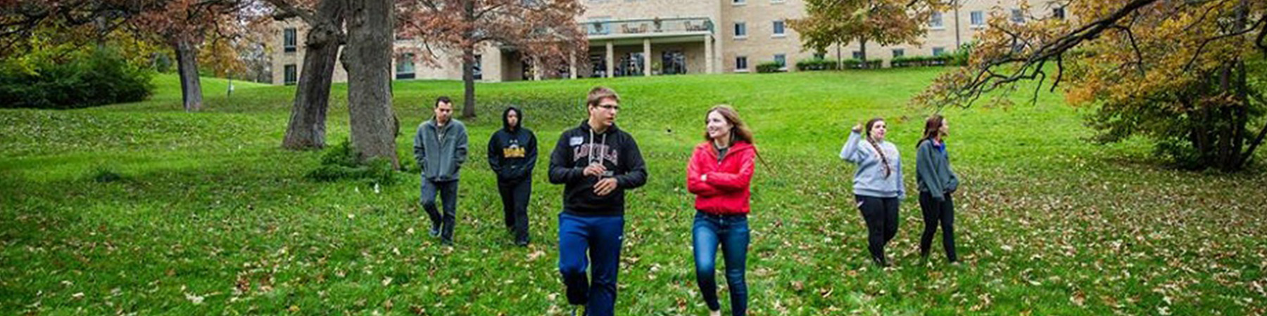 Students walk the grounds of the Loyola Retreat & Ecology Campus