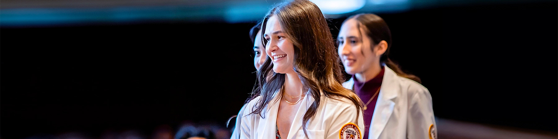 Loyola nursing students at a ceremony