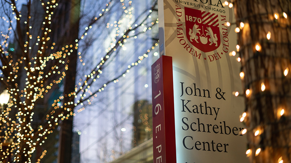 The Schreiber Center shines as Pearson Street is decorated with holiday lights.