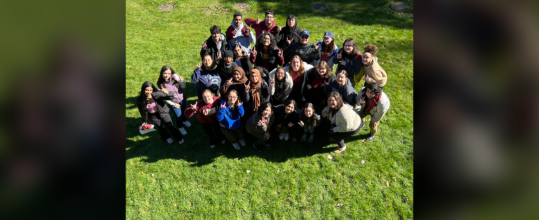 Aerial view of a diverse group of Loyola University Chicago scholar students.