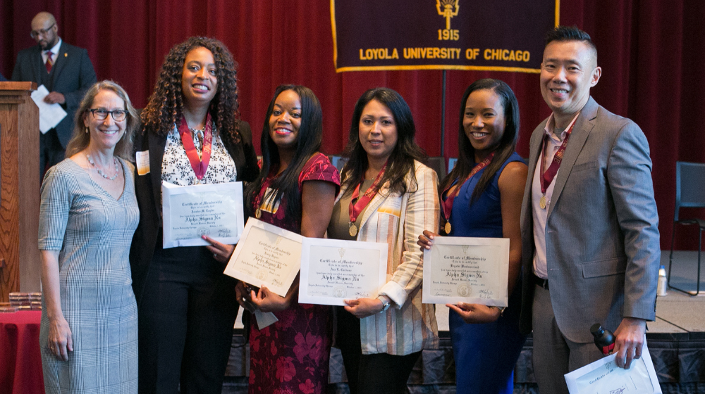 SCPS Alpha Sigma Nu inductees with Interim Dean Widen