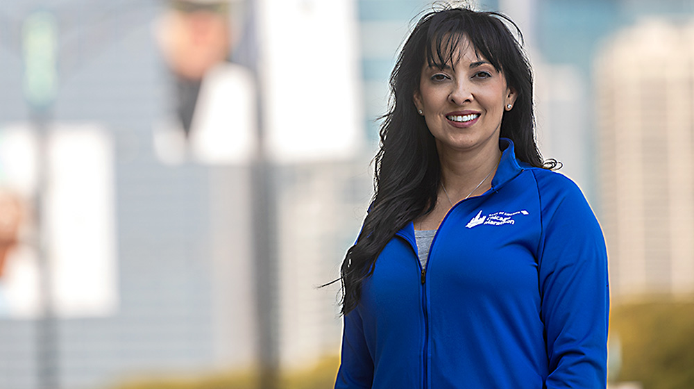 Portrait of Michele Kerulis, Loyola alumnae and psychologist for the Chicago Marathon.